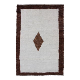 Mid 20th Century Vintage Turkish Tulu Rug With a Minimalist Design in Off White and Brown For Sale