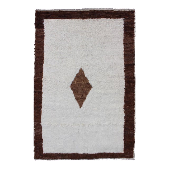 Mid 20th Century Vintage Turkish Tulu Rug With a Minimalist Design in Off White and Brown For Sale
