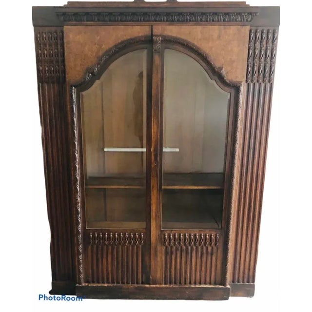 Superbly elaborate and massive bookcase by Emil Gerstel of Prague. Early 1900. Walnut. 2 shelves included, but certainly...