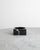 A rare and iconic "pk-bowl" ashtray in solid black marble by poul kjærholm and produced in denmark and a limited serie in...