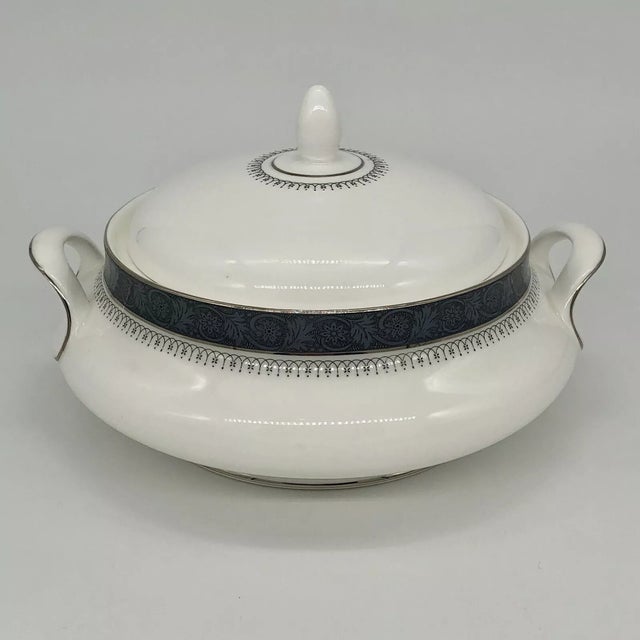 Elegant and timeless, this Royal Doulton Sherbrooke round covered vegetable bowl showcases classic English bone china...