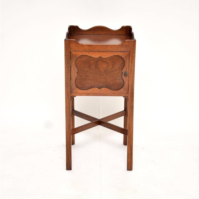 A smart and very well made antique Georgian style cabinet on legs. This was made in England, it dates from around the...