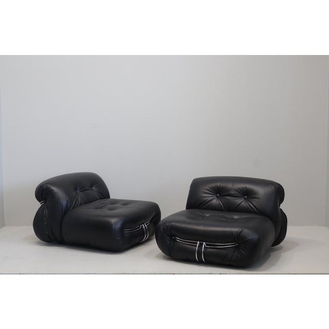 "Soriana" lounge chairs by Afra & Tobia Scarpa for Cassina, in leather and metal, 1969, set of two. Although technically...