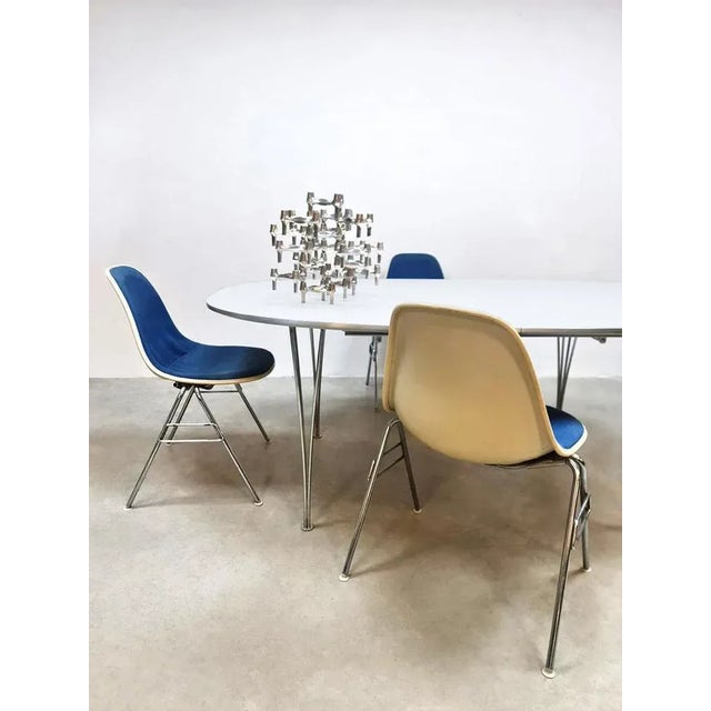 Color up your room! Absolutely a design icon, this set of 4 Herman Miller chairs. These original vintage fiberglass bucket...