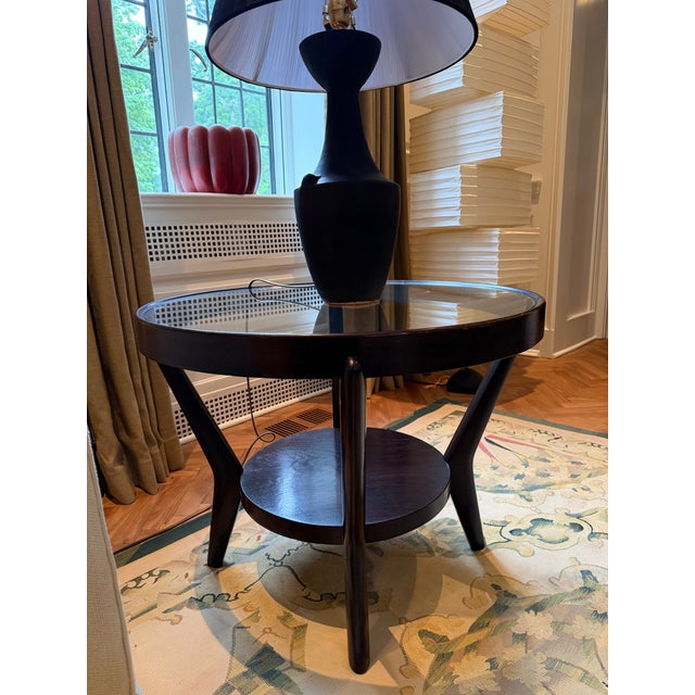 Exceptional and increasingly collectible pair of mid-cnetury modern side tables designed by renowned Czech designes Karel...
