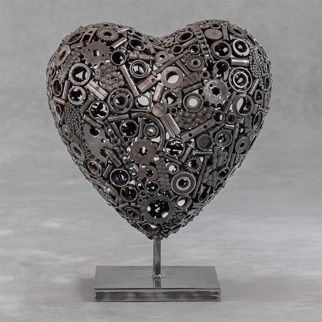 Industrial Recycled Metal Heart Sculpture – Handcrafted Steel Art This one-of-a-kind recycled metal heart sculpture is...