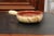 A French glazed pottery serving dish from the 19th century, with terracotta and gold glaze. Created in France during the...