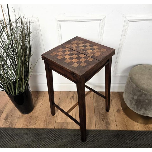 Beautiful Italian solid walnut games side table with inlay chess game over four classic simple legs connected to one...