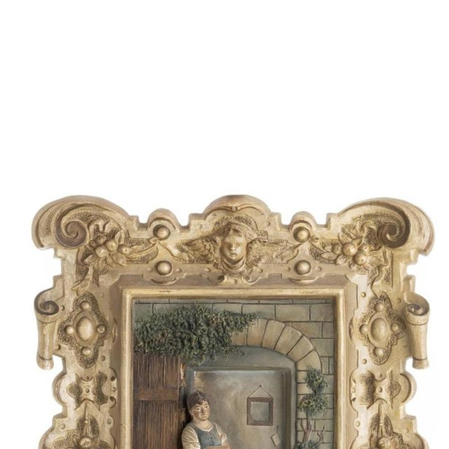 Porcelain - Pair of wall plaques. German, early 20th century, in polychrome plaster depicting male and female figures,...