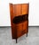 Outstanding Danish rosewood corner cabinet designed in Denmark, circa 1960s. Features three drawers, an open storage space...