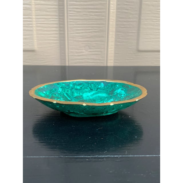 A stunning Russian style malachite bowl with brass trim Late 20th century Measures: 4.25"W x 3.13"D x 0.75"H. Very good...