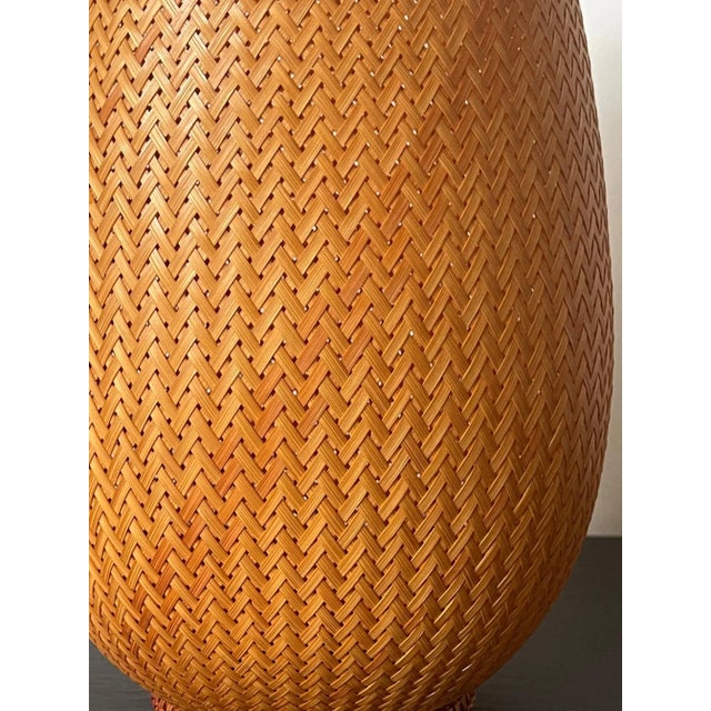 A beautifully hand-woven Japanese flower basket (ikebana) by bamboo artist Hatakeyama Seido (b. 1930). Entitled "Ajiro...