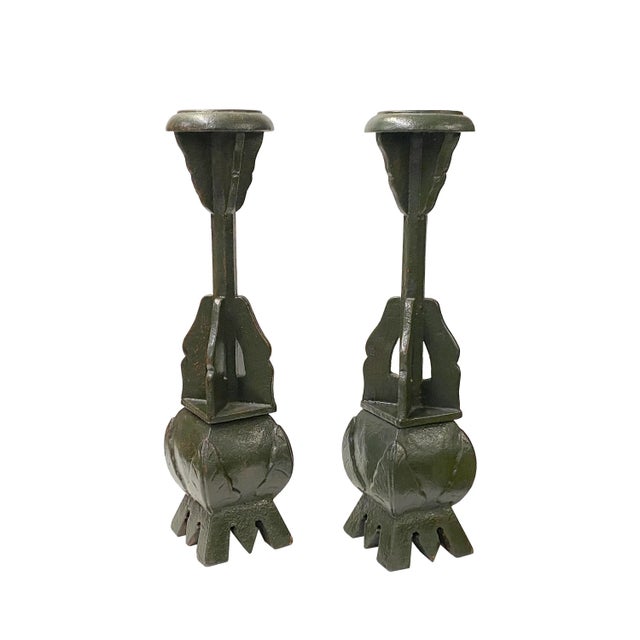 This is a pair of handmade candle holders / display poles that are made of wood and finished in distressed green color. (...