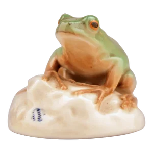Mid-20th Century Modern German Glazed and Painted Porcelain Frog Sitting on a Rock by Manufacturer Nymphenburg