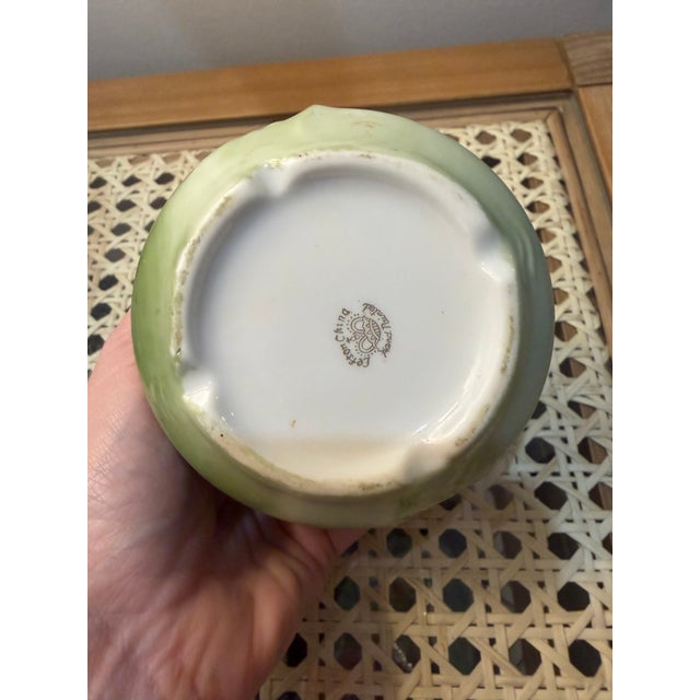 Lefton China was a popular brand of decorative porcelain, often featuring hand-painted designs, produced by the George...