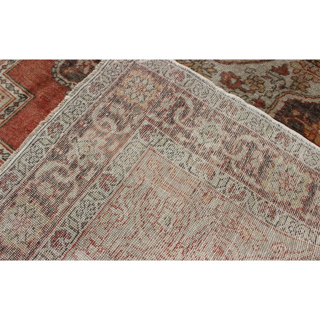 Antique Turkish Oushak Rug With Floral Medallion in Red, Charcoal and Cream For Sale - Image 9 of 10