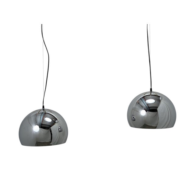Pair of space pendant lamps from the 70s. In excellent condition, with light marks visible only against the light....
