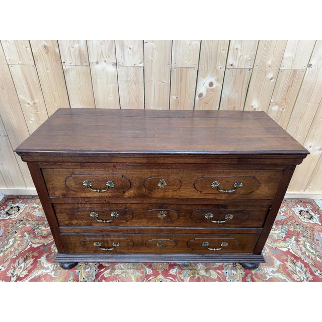 Solid oak commode with three drawers, louis xiii style, 18th century. the silhouette is simple and sturdy, characteristic...