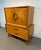 Beautiful mid-century modern gentleman’s chest featuring a striking finish, sculpted drawer pulls, and eye-catching...