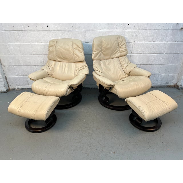 Comfort meets iconic Scandinavian design with this pair of authentic J.E. Ekornes “Stressless” leather recliners, each...