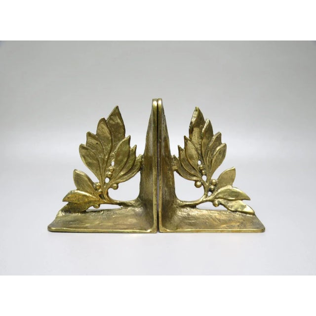 A pair of exceptional bronze bookends from the 70s, Brutalist Art in combination with floral elements. The bookends are...