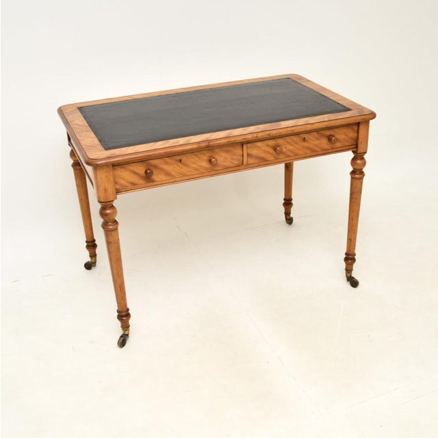 A fantastic antique Victorian satin wood writing table / desk. This was made in England, it dates from around the...