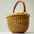 This beautifully handcrafted vintage Nantucket Lightship Basket is a signed piece, marked by the artisan on the underside....