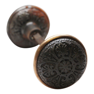 Pair of Cast Iron 4 Fold Door Knobs With a Bronze Rim