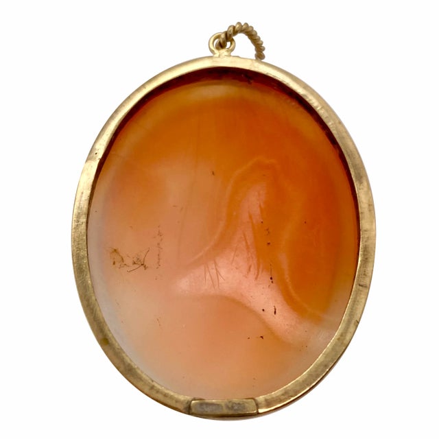 This is part of Chairish’s Costume Jewelry assortment. This is a Victorian period carved shell cameo depicting two figures...