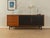 Unique sideboard from the 1960s in Scandinavian design. High-quality body in teak veneer with four drawers, two Formica-...