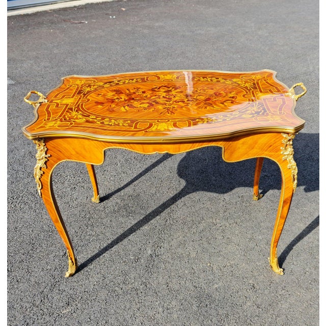 Elegant real wood Marquetry desk/ Tea table, Inlays and Bronze Ormolu French style. Height 24.5''. width 36". Depth 24"