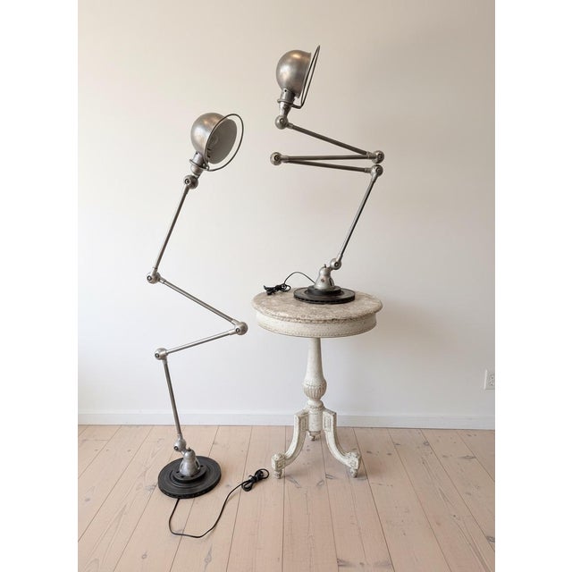 Two available. French c 1960. Jieldé Lamps, can be used as floor or table lamps. Adjustable. Rewired by professional for...