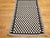 Add a touch of cultural heritage and visual intrigue to your space with this vintage Native American Navajo area rug,...