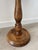 Charming little vintage wooden side table with an elegant and timeless silhouette. Its round top rests on a central turned...