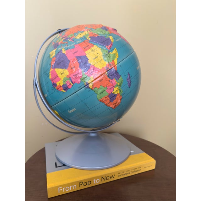 Vintage Replogle Globes Traveler world globe with a 12-inch diameter and raised-relief surface. Political map shows...