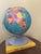 Vintage Replogle Globes Traveler world globe with a 12-inch diameter and raised-relief surface. Political map shows...