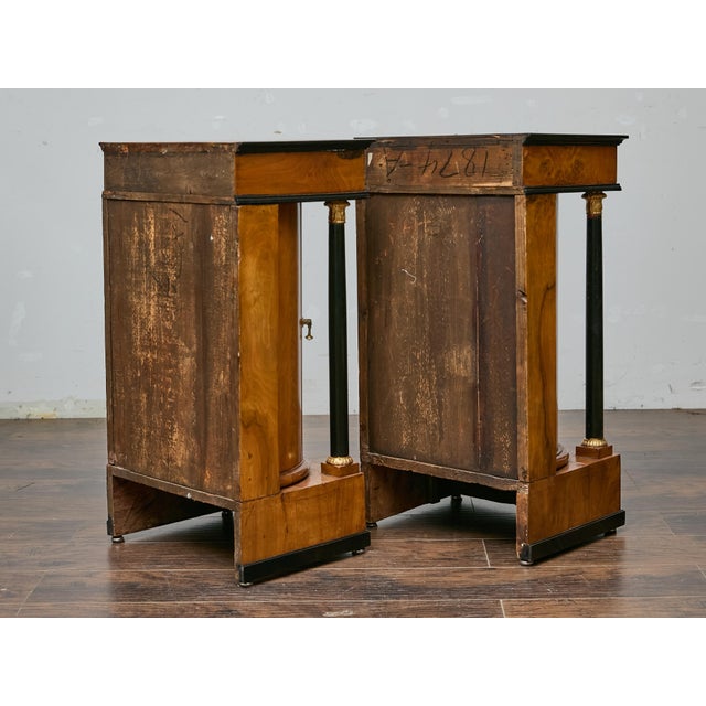 This exquisite pair of Austrian Biedermeier cabinets, likely Viennese and dating to circa 1840, embodies the elegance and...