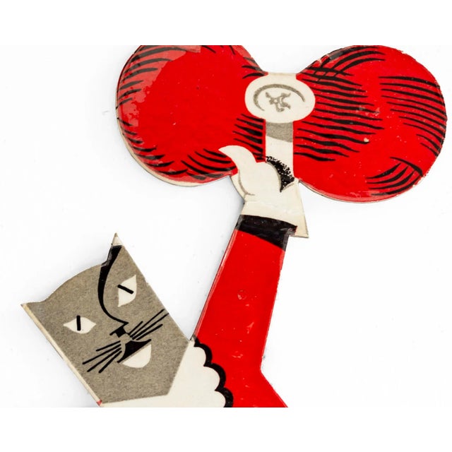 Date: 1930s Size: 6 x 8 inches About The Poster: A charming and detailed point-of-purchase advertisement for a shop that...