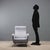 Armchair with foam padding, fabric upholstery, metal legs. This piece is attributed to the mentioned designer/maker. It...