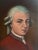 Giclee portrait painting of Wolfgang Amadeus Mozart (1756-1791), displayed in vintage wood frame. Circa, 1980s.