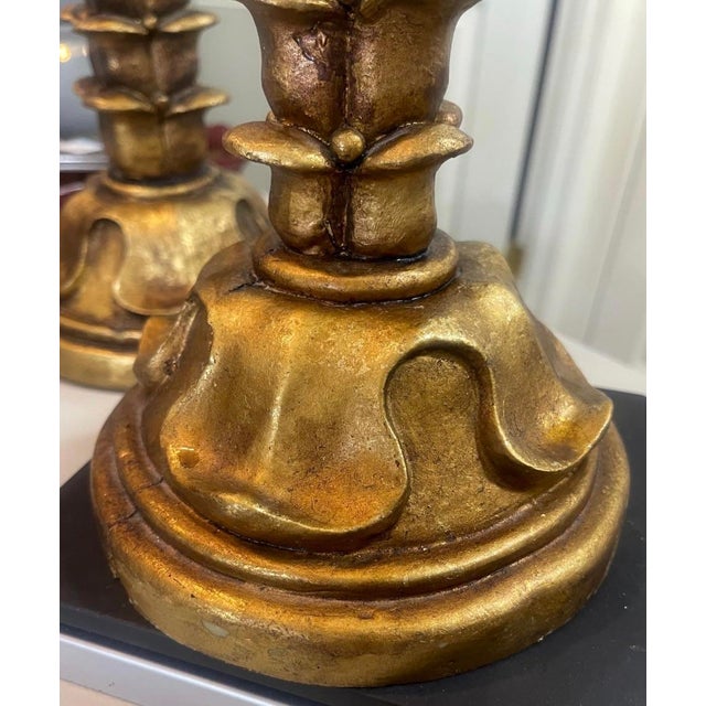 Beautiful vintage pair of decorative gold-tone palm tree candle holders featuring sparkling crystal prisms and elegant...