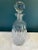 This vintage cut crystal decanter features a diamond-patterned body and a large faceted stopper that adds both function...