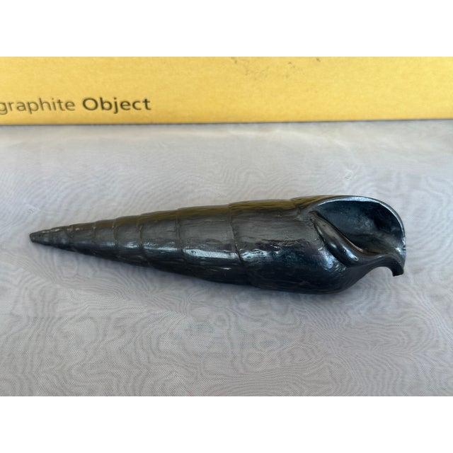 Created by Agelio Batle in his San Francisco studio, this cone seashell sculpture is a practical piece of art. The...