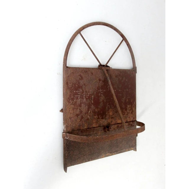 Antique metal barn hay door with a timeworn barn red finish and punched lettering reading "Life Time." Featuring hinge...