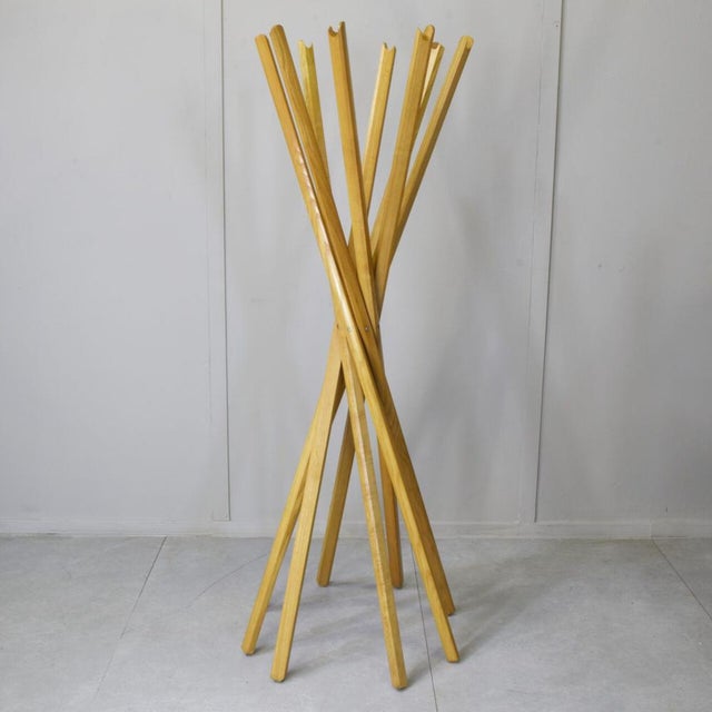 The Sciangai was designed in 1973 by the Milanese trio De Pas, D'Urbino and Lomazzi — a folding coat stand whose operating...