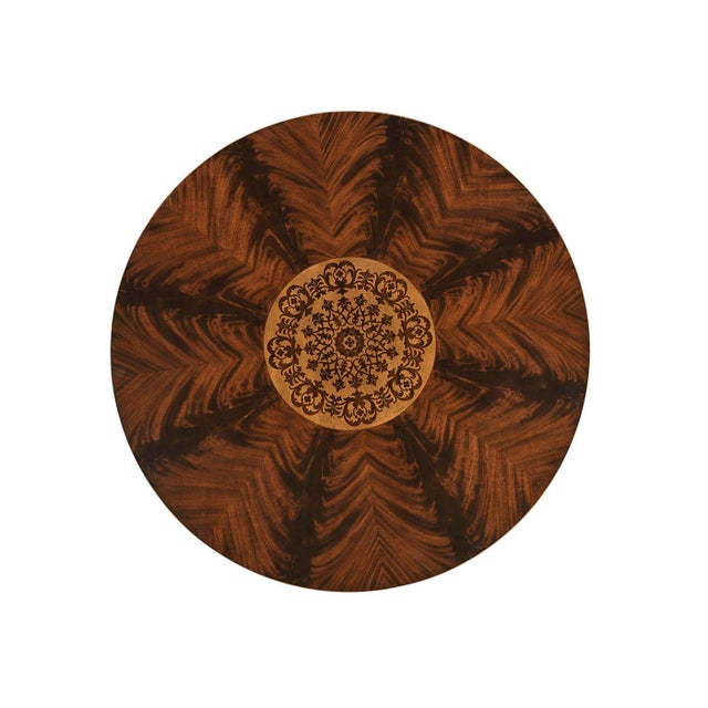 This inlaid mahogany table shows the bold craftsmanship and decorative style of mid-19th-century English design. Its...