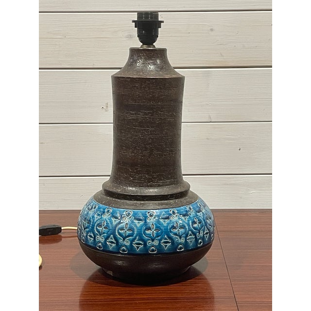 Table lamp by Aldo Londi for Bitossi Ceramiche, 1970s. The table lamp is handmade from brown and turquoise stoneware, with...