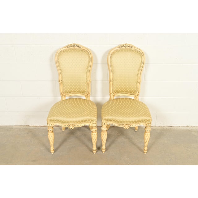 A gorgeous pair of French Regency Louis XVI style side chairs or dining chairs By Karges Furniture USA, Circa 1960s...