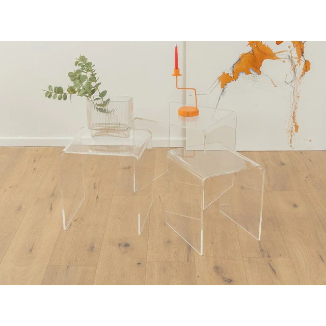 Classic nesting tables from the 1960s. High-quality frame made of transparent acrylic. The set includes three tables....
