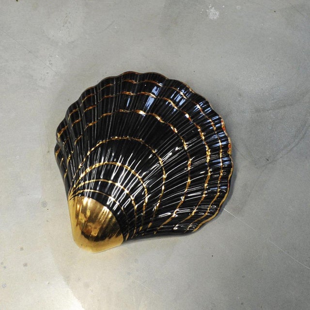 Vintage Gold and Black Ceramic Shell Wall Vase, 1950s This piece is attributed to the mentioned designer/maker. It has no...
